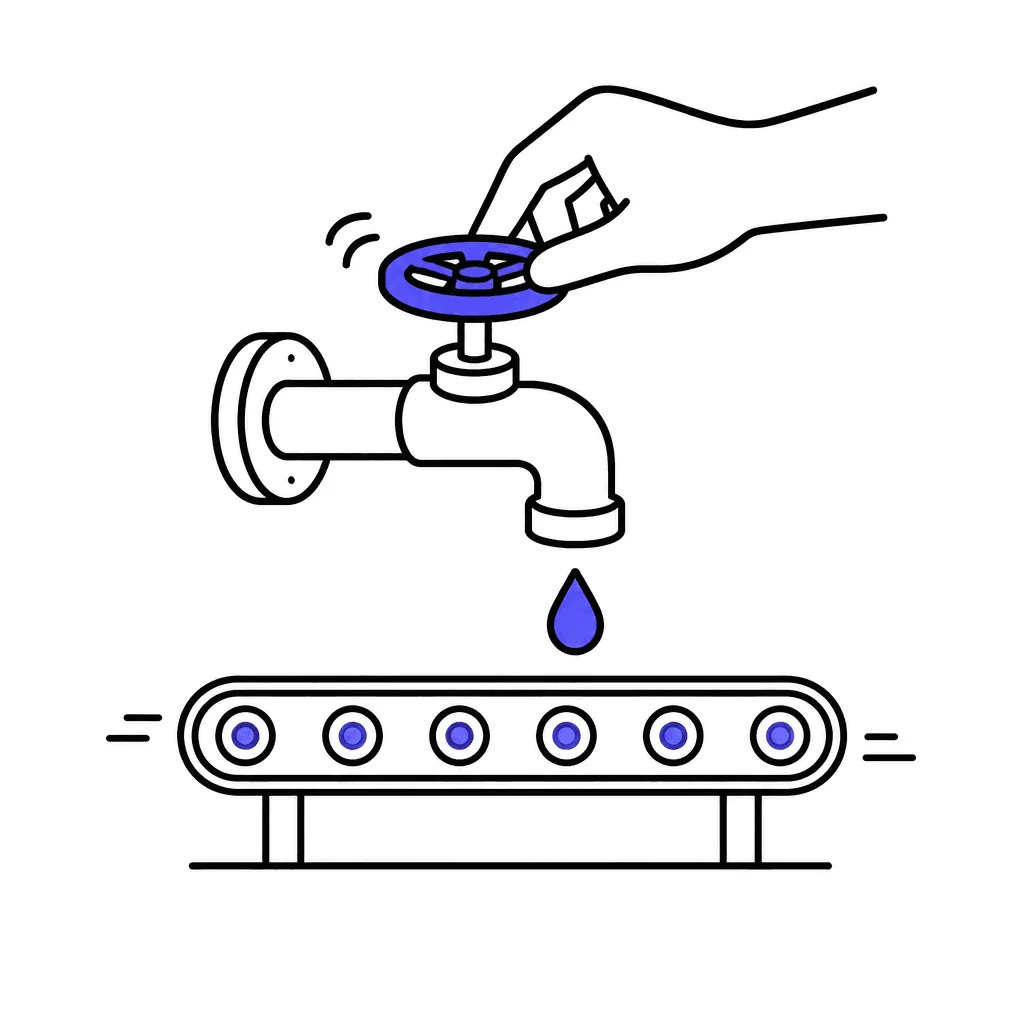 A faucet with an indigo valve above a conveyor; a hand calmly turns it down while the conveyor keeps rolling.